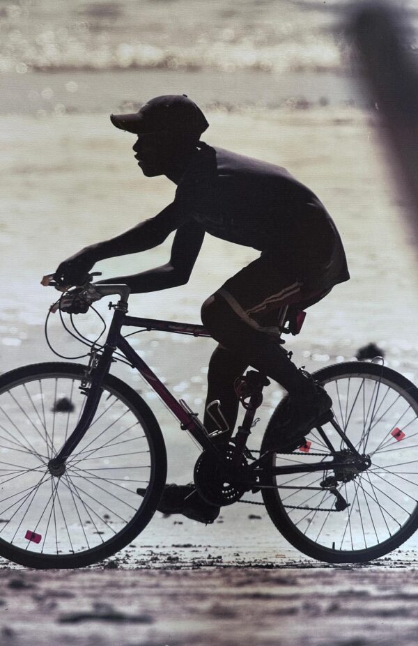 Cyclist on sand – Madagascar
